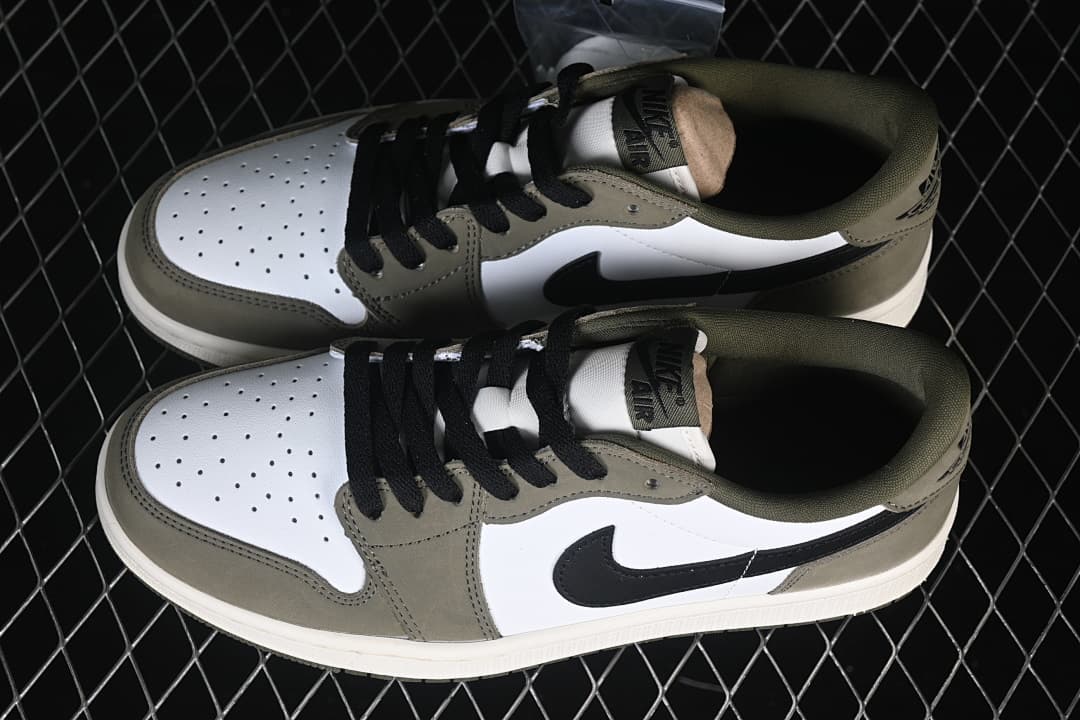 Pair of olive, white, and black low-top sneakers viewed from above