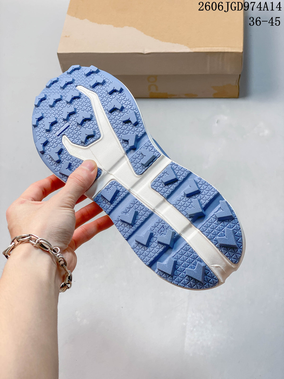 Close-up of the blue treaded outsole on an On Cloudvista 2 shoe