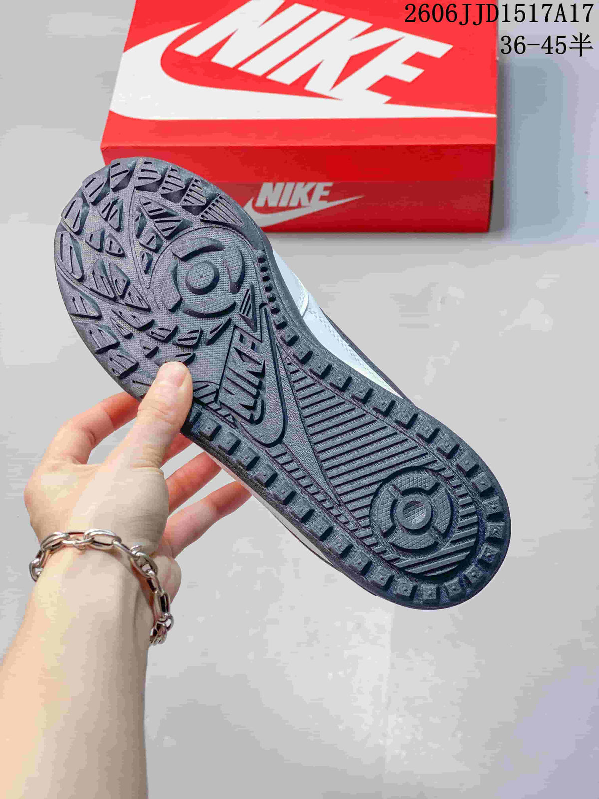 Underside of a Nike Terra Manta sneaker showing its patterned dark gray outsole.