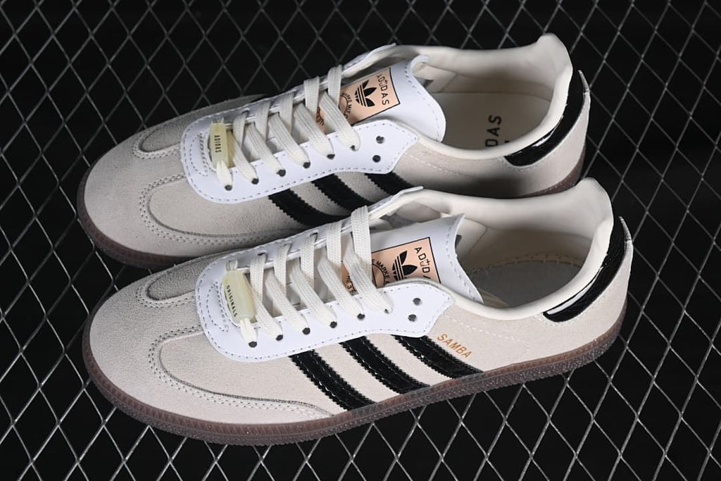 Pair of beige and black Samba OG sneakers viewed from above