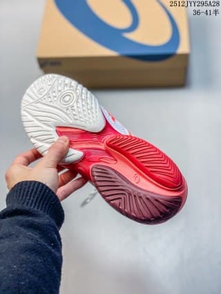 Outsole view showing the white, red and dark outsole sections of the ASICS SKY ELITE FF 3 sneaker.