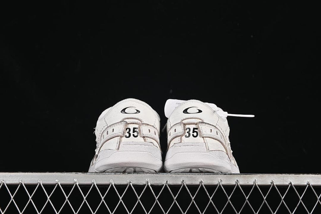Rear view of the pair showing heel details and size 35 markings