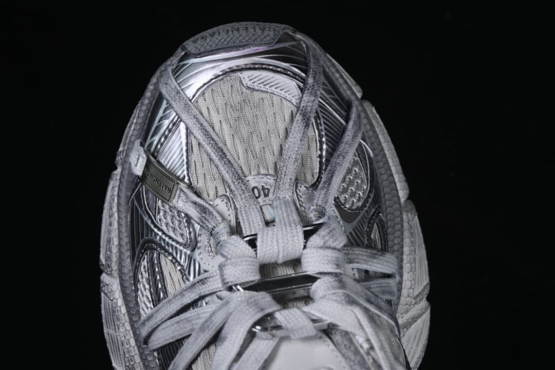Top-down view of the sneaker showing its layered lace arrangement