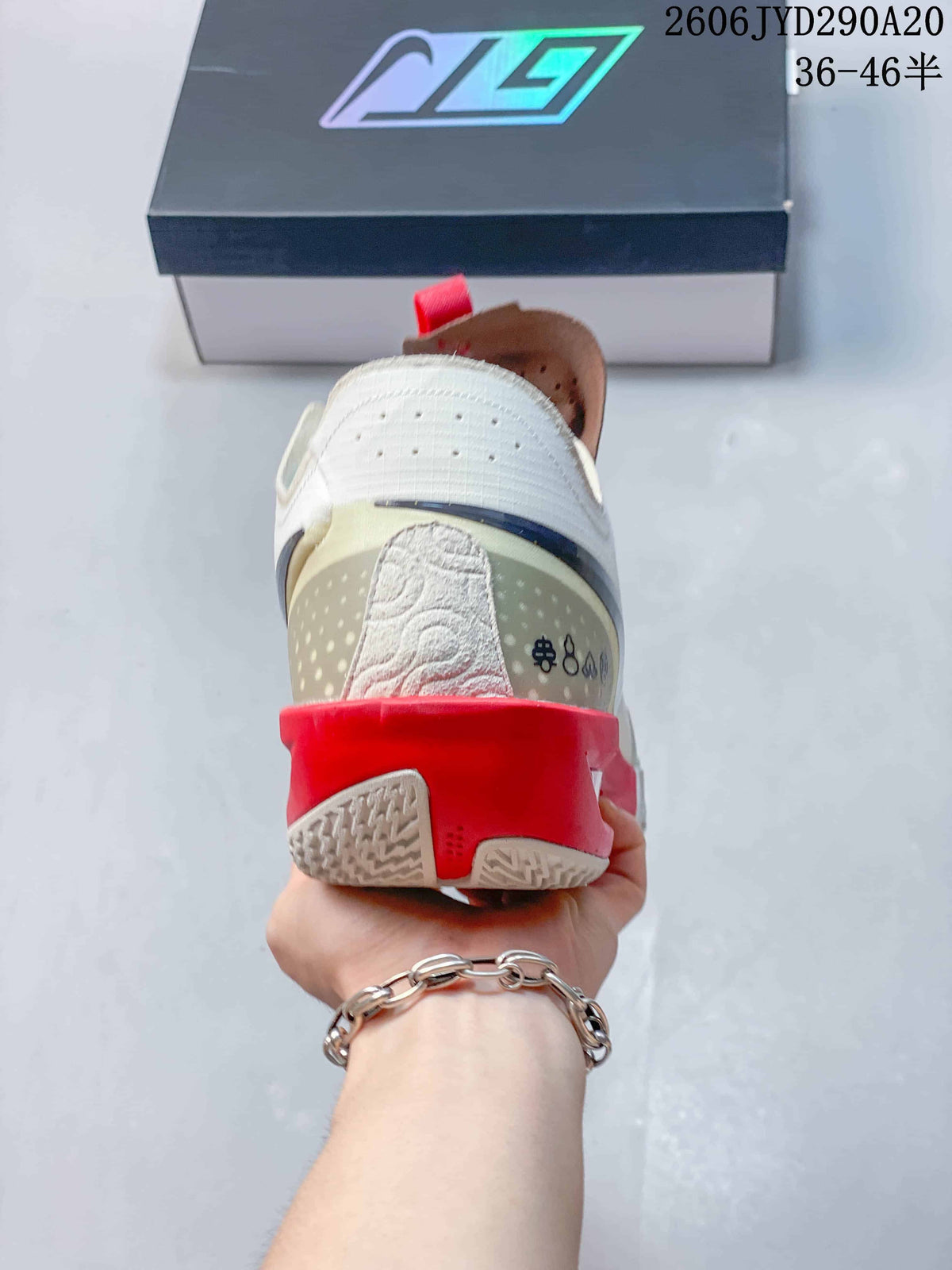 Rear view showing the heel and red outsole accents