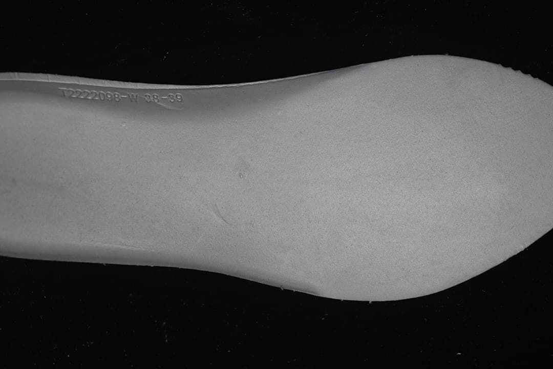 Close-up of embossed markings on the shoe outsole