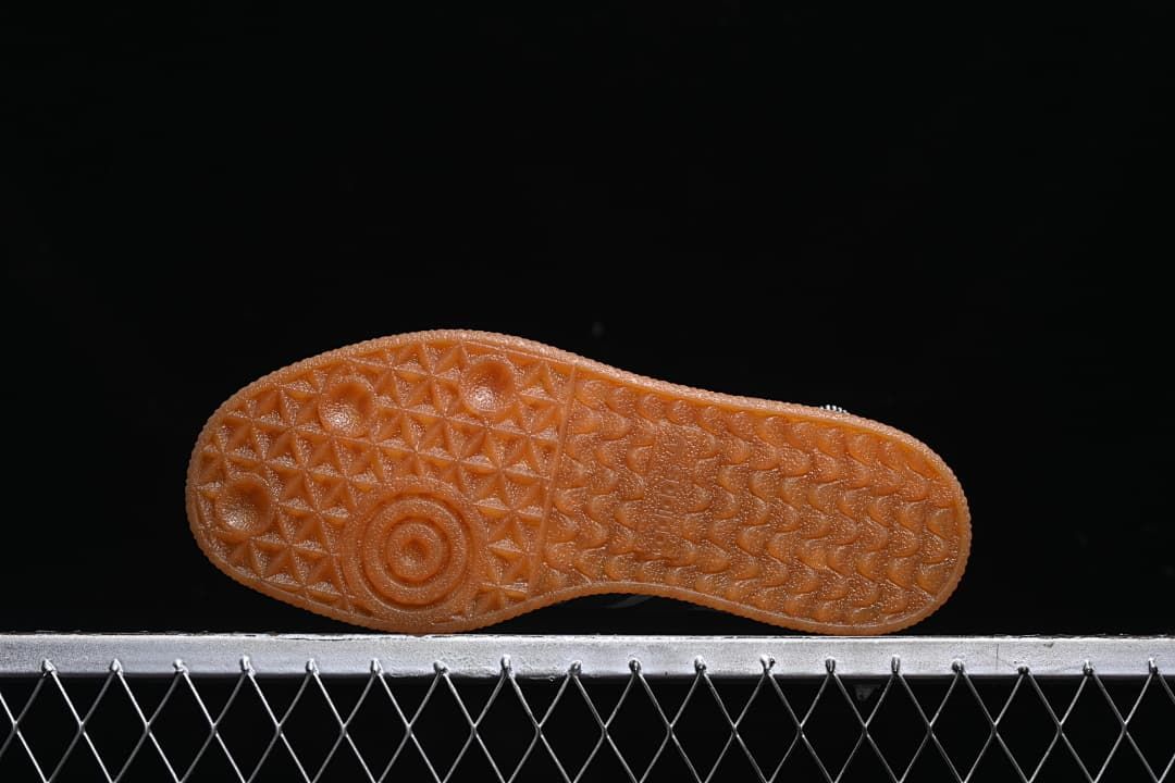 Underside view of the gum-colored textured outsoles