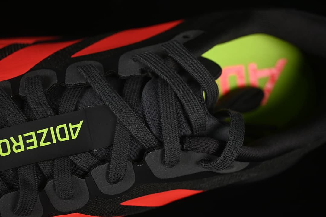 Close-up of the black laces and Adizero-branded tongue
