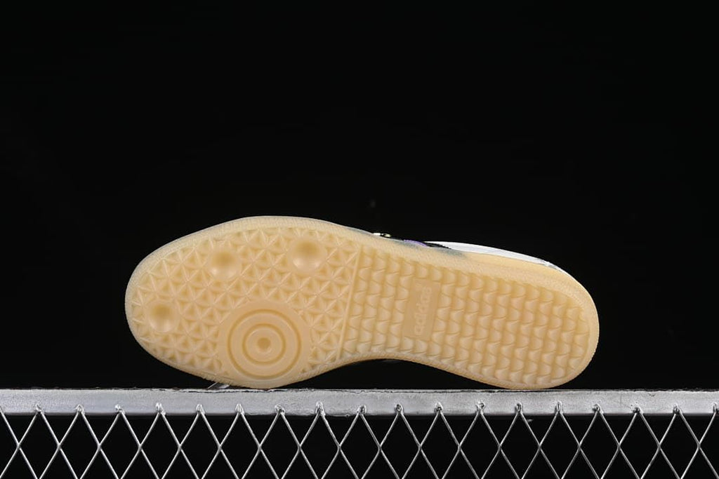 Underside of the sneaker showing a gum-colored patterned outsole