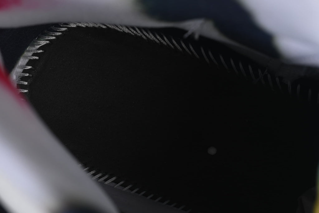 Close-up of the dark interior lining and stitching.