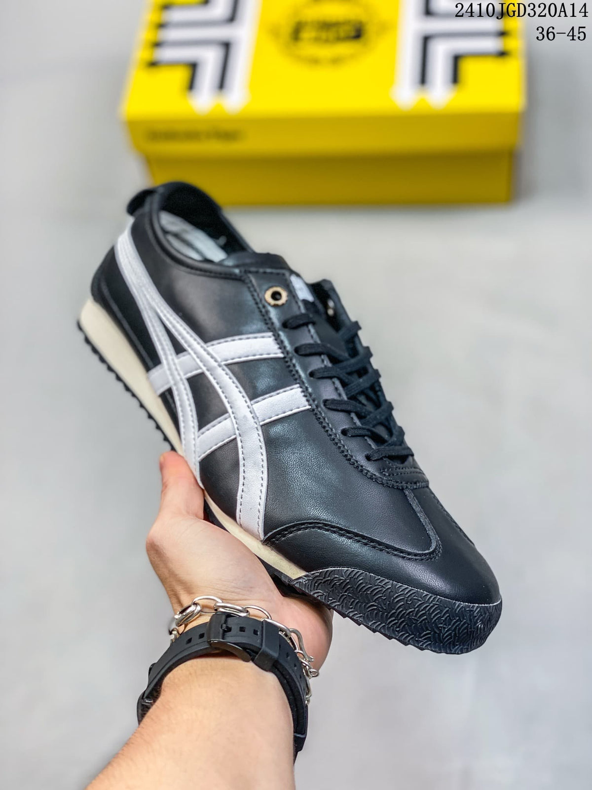 Black low-top sneaker with white side stripes