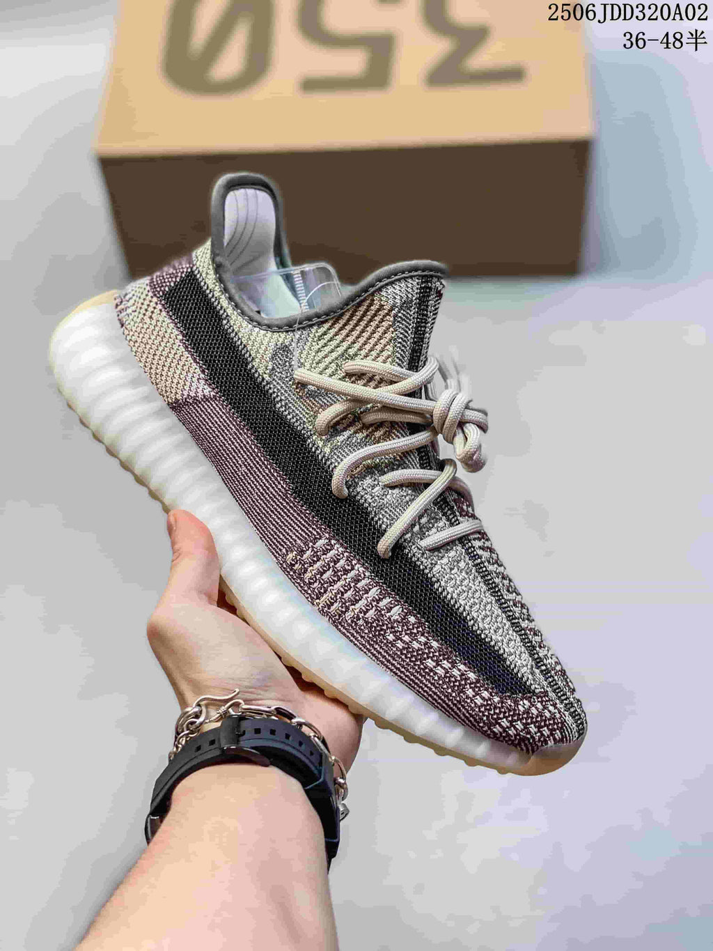 Multicolor knit-look sneaker with a black side stripe, pale laces and white ribbed sole