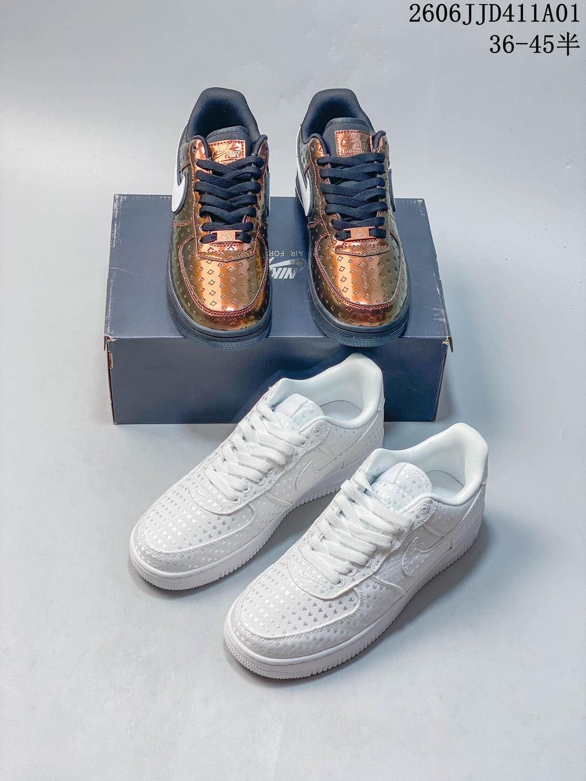 Copper-toned and white patterned Nike Air Force 1 low-top sneaker pairs shown together.
