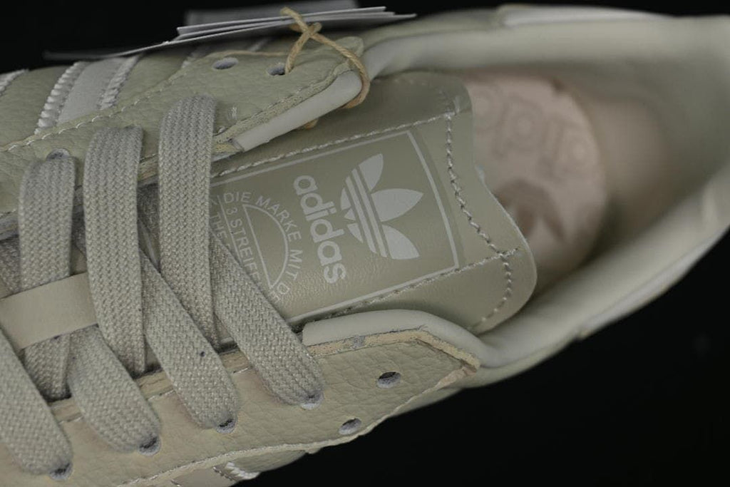 Close-up of the tongue branding, laces, and upper panels.