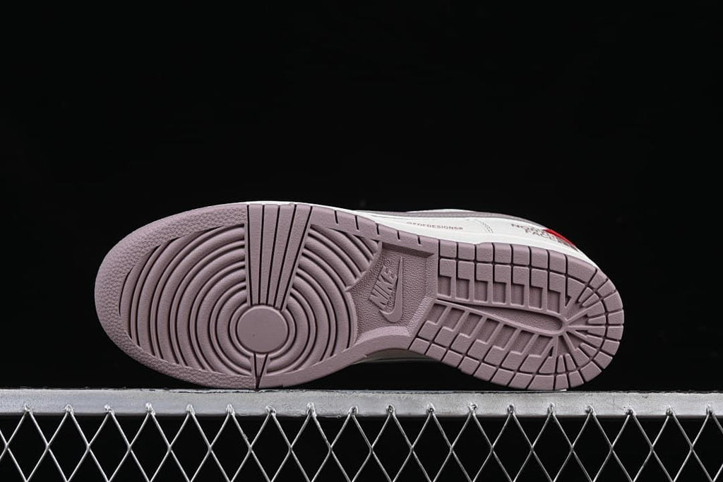 Underside view showing the mauve rubber outsole tread