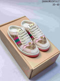 Pair of beige and brown Gucci Screener-style lace-up sneakers with pink and green side stripes, shown on a box.