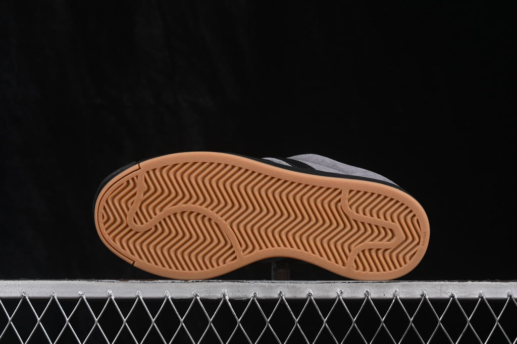 Underside view showing the gum-colored outsole with a herringbone traction pattern.