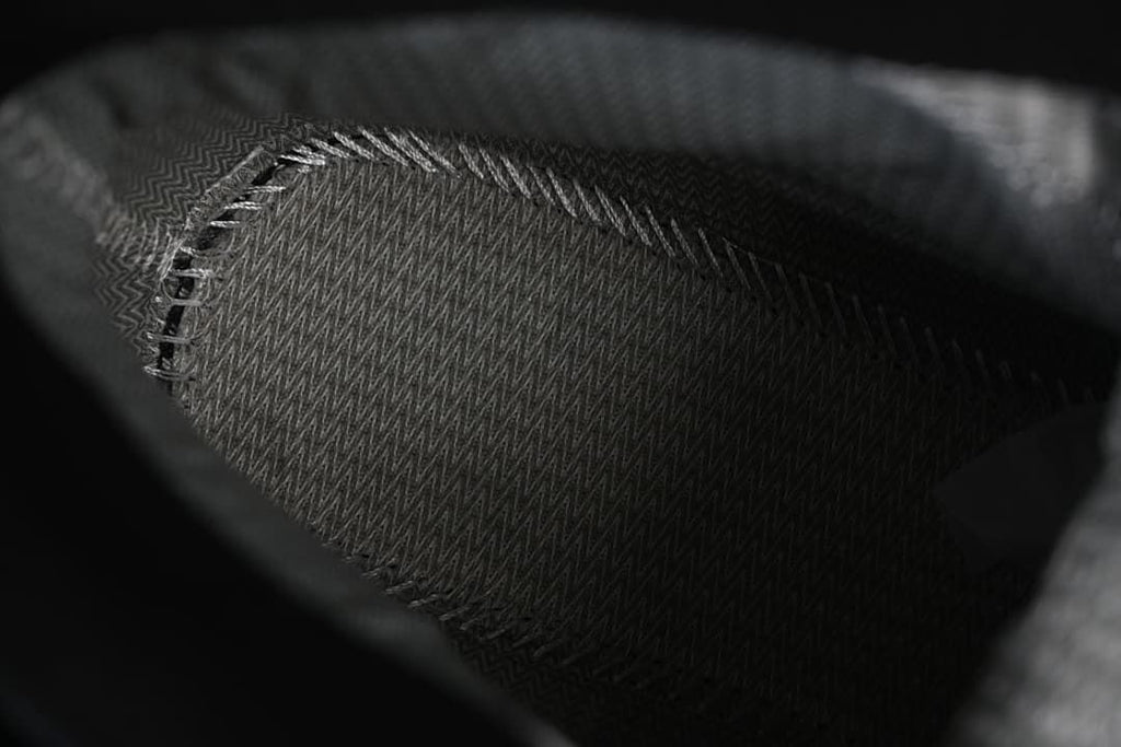 Close-up detail of the boot's dark interior lining.