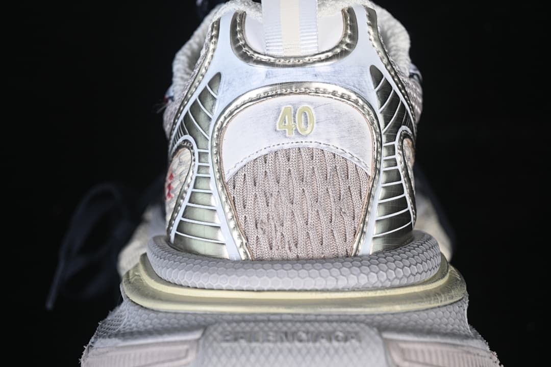Rear view of the sneaker showing a size 40 marking and layered heel details.