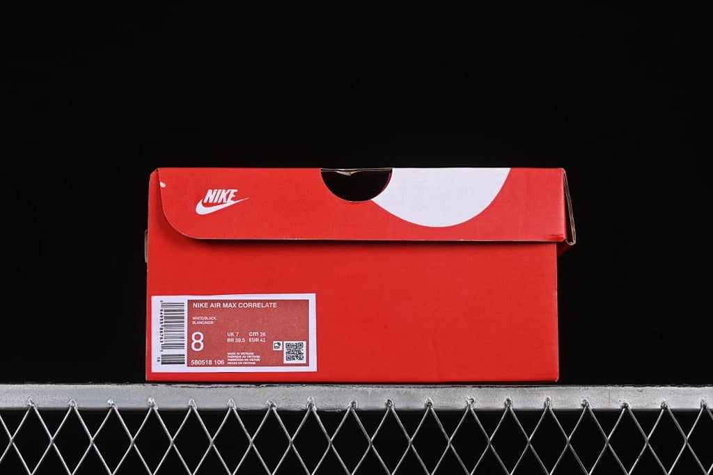 Red shoebox with a label identifying Nike Air Max Correlate, style code 580518-106, and EU 41.