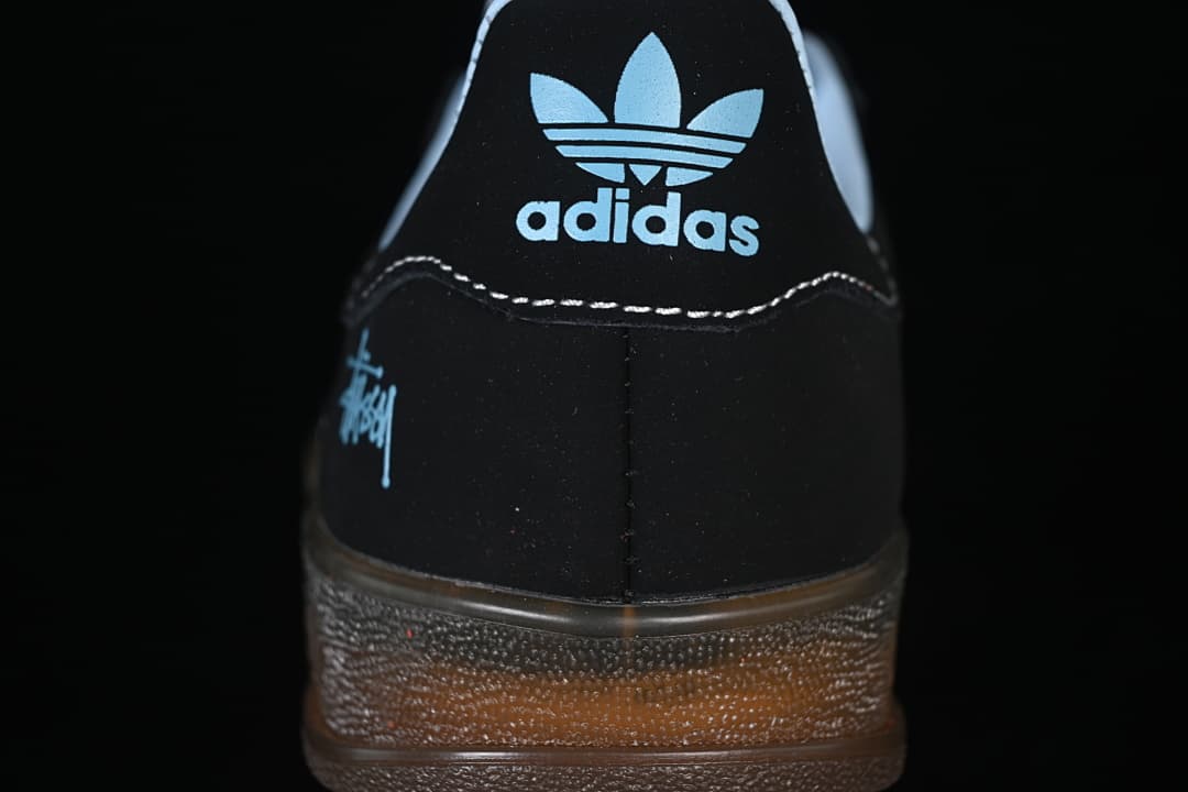 Rear view of the sneaker showing the heel branding and gum-colored sole