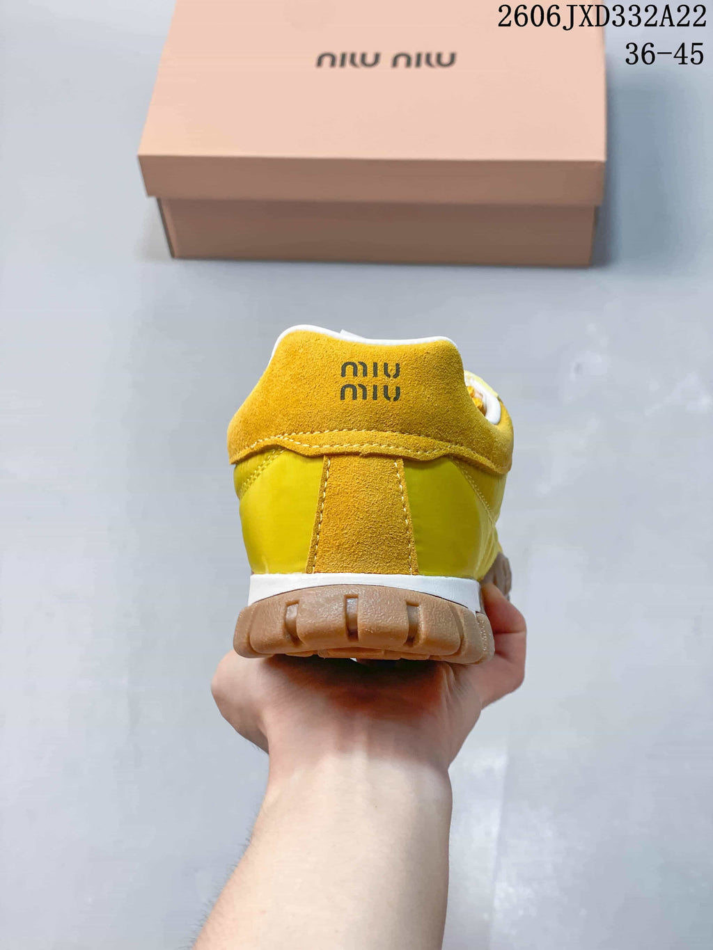 Rear view showing the heel details and brown outsole