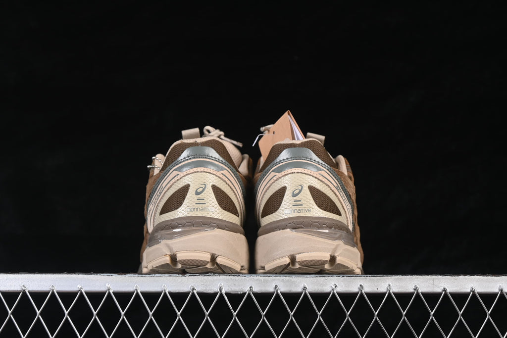 Rear view of the pair highlighting heel panels and soles.