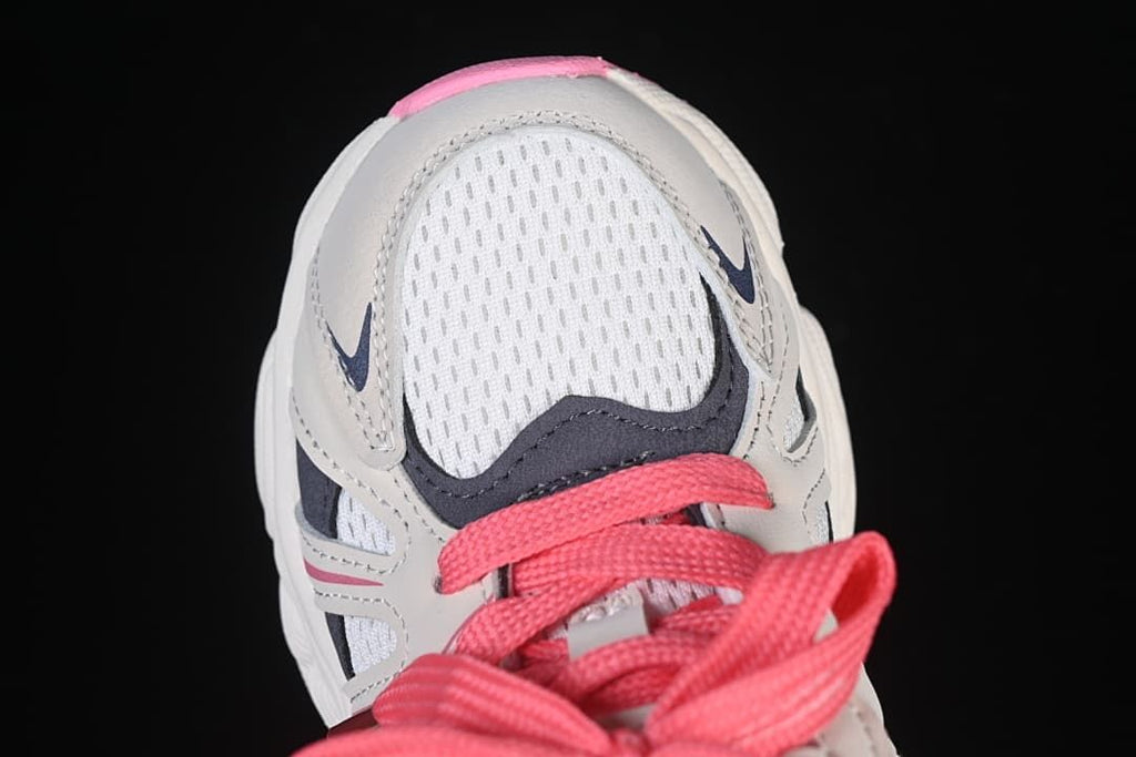 Top view of the mesh toe area and pink laces.