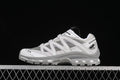 Side view of gray and white Salomon XT-Quest GTX sneakers