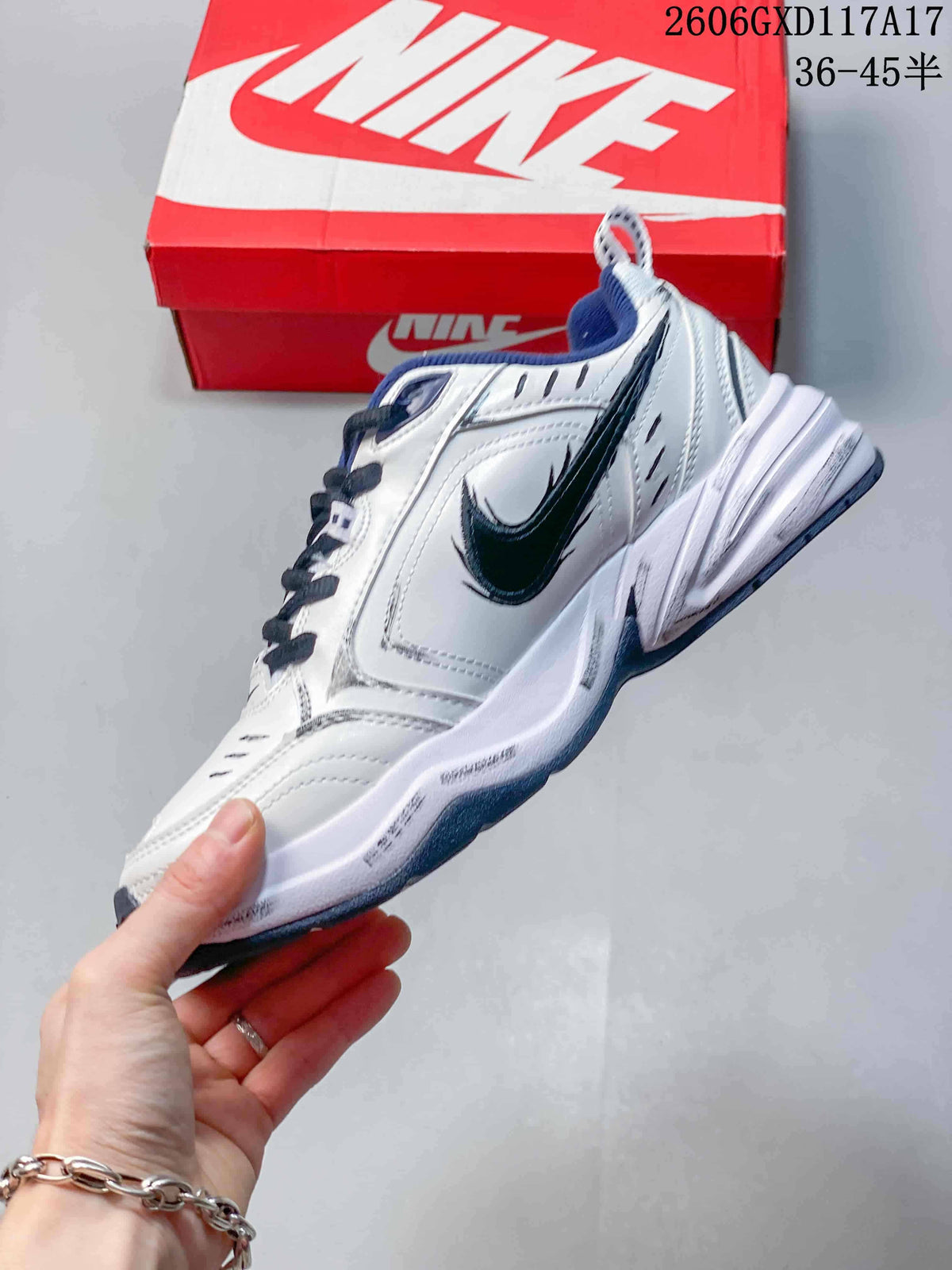 Side view of the sneaker showing the Swoosh and layered sole