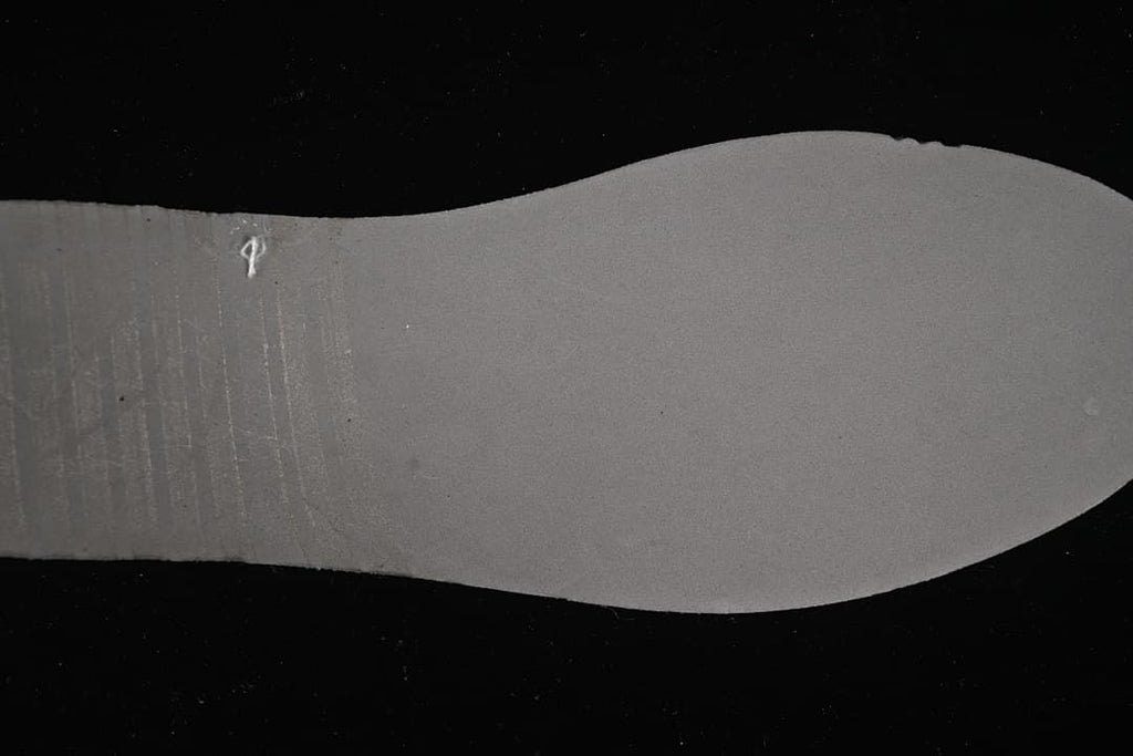 Grey outsole shown from below