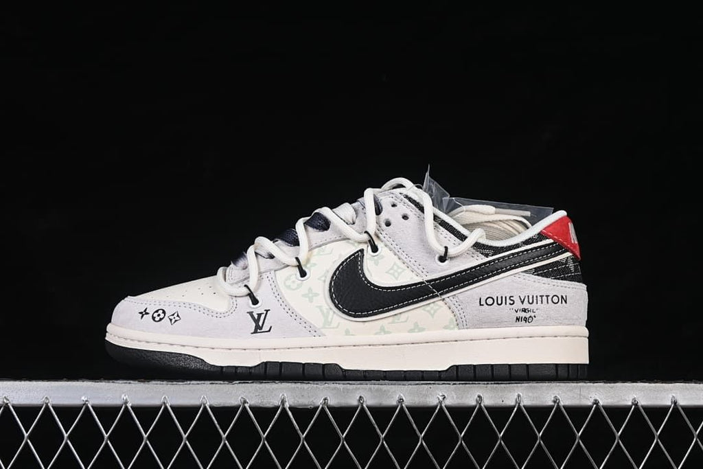 Side view of a white and black low-top sneaker with patterned panels and contrast branding
