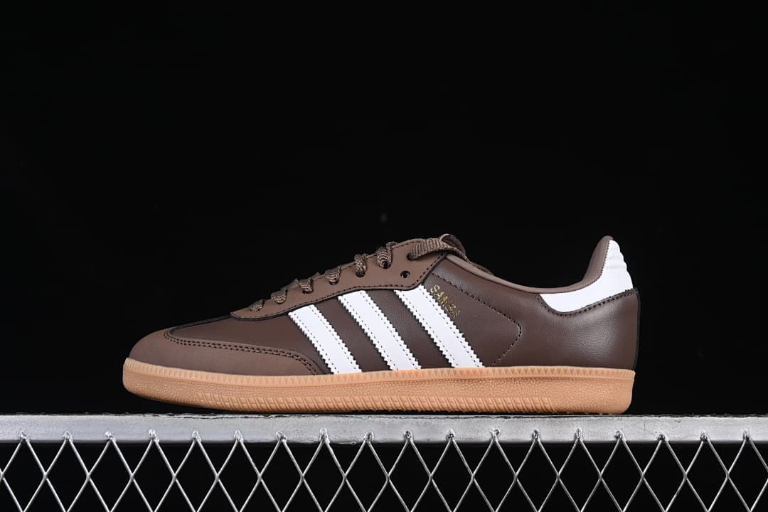 Side view of brown adidas Samba OG sneakers with white stripes and gum-colored outsole