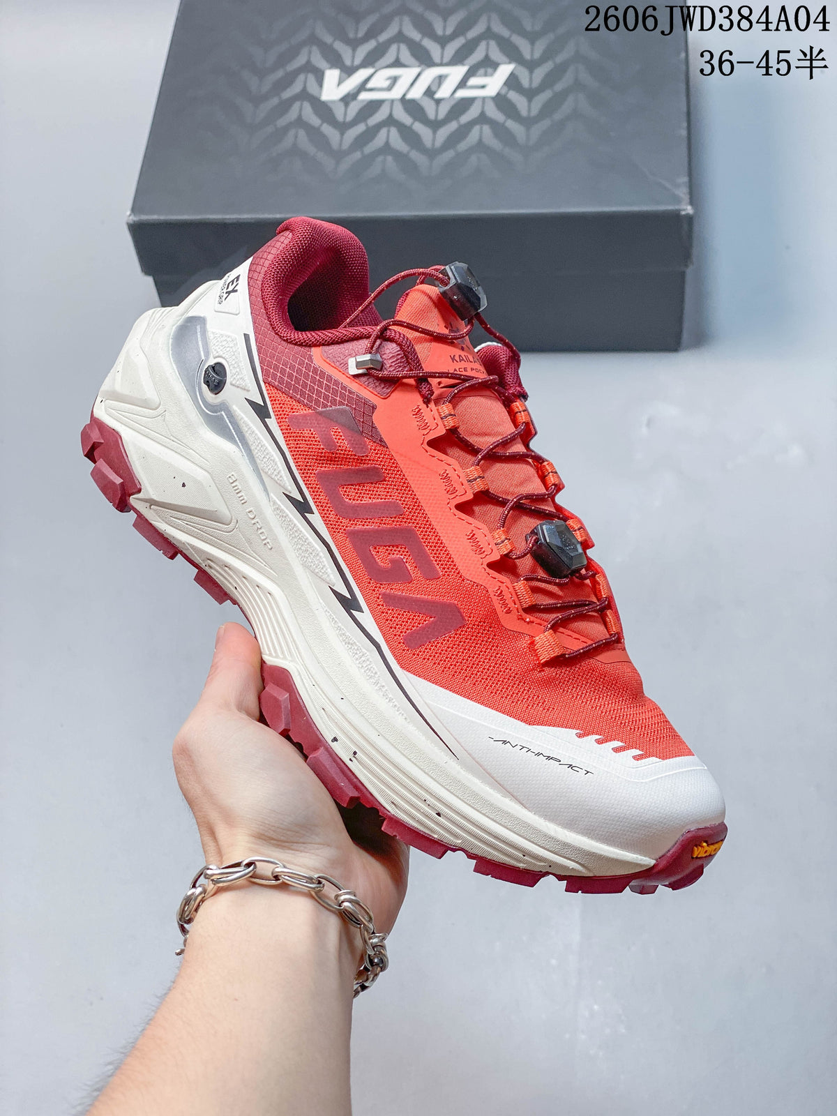Angled side view of the coral-orange KAILAS trail shoe with burgundy outsole and white midsole.
