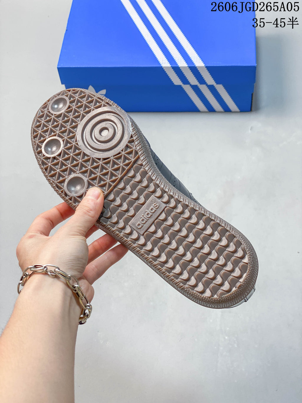 Close-up of the patterned gum-colored outsole on an adidas Samba Jane sneaker