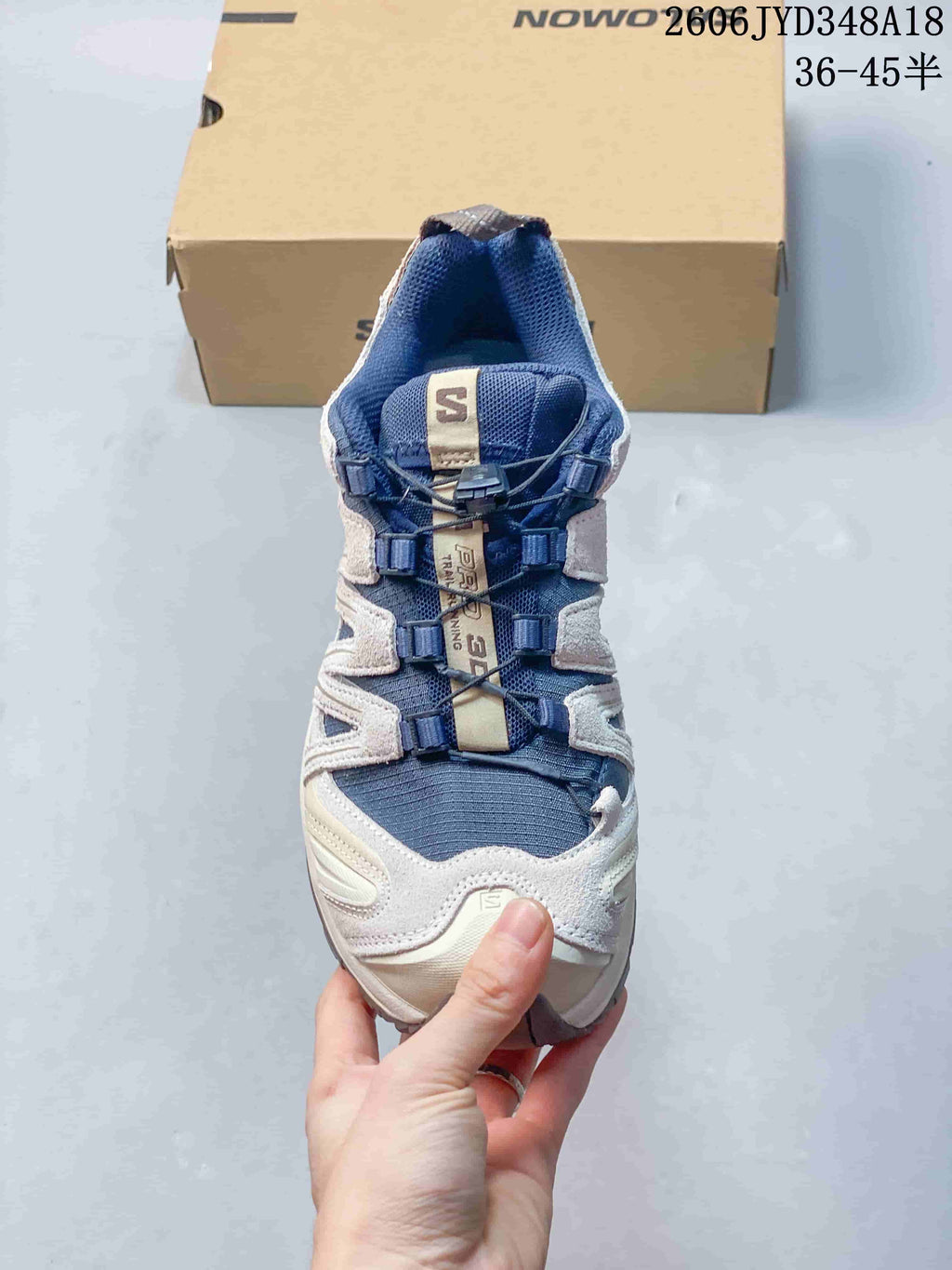 Front view of a Salomon XT-3D shoe with cord closure