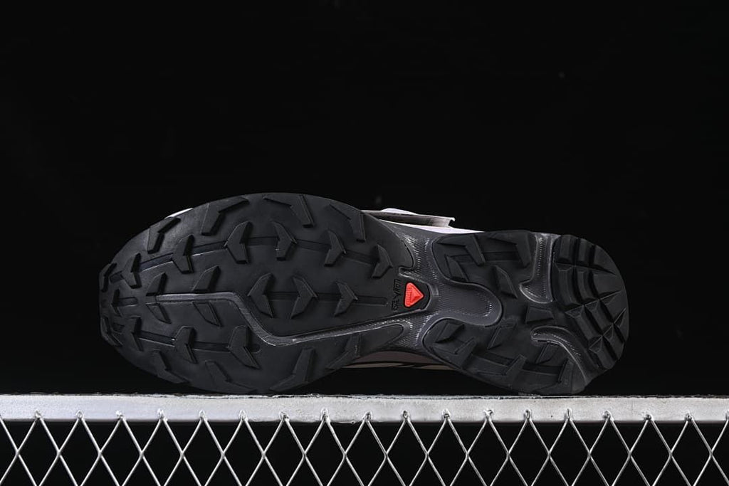 Underside view showing the black patterned outsole