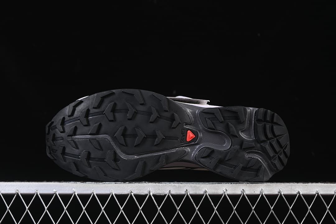 Underside view showing the black patterned outsole
