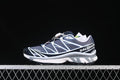 Side view of navy, gray, and white Salomon XT-6 GTX shoes