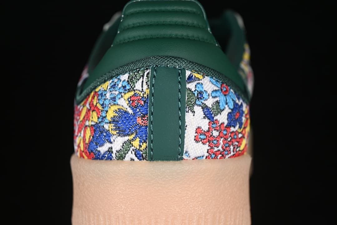 Rear view highlighting the green heel and multicolored floral-patterned panels.