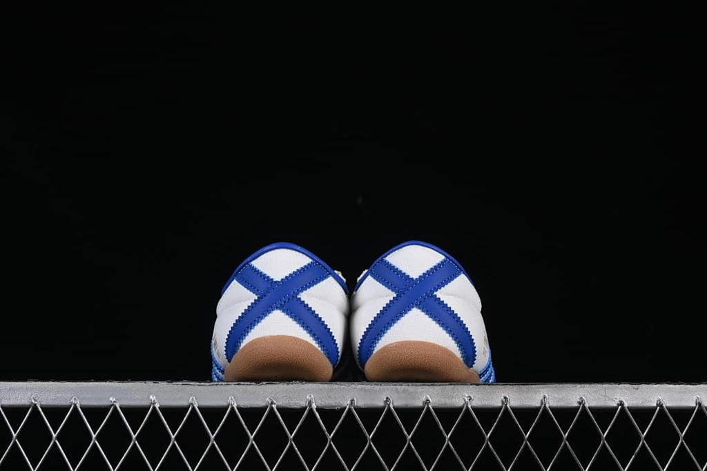 Rear view of both sneakers showing blue heel detailing