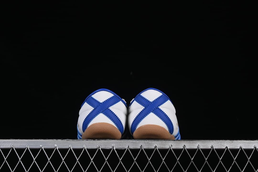 Rear view of both sneakers showing blue heel detailing
