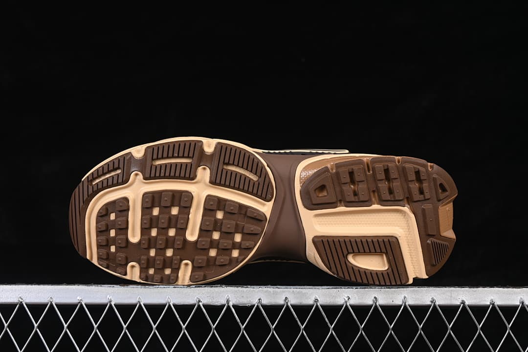 Underside view showing the patterned brown and beige outsole