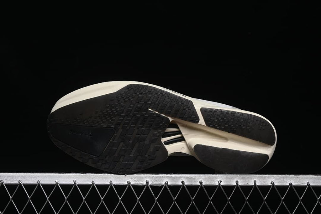 Underside view showing the black outsole and segmented tread