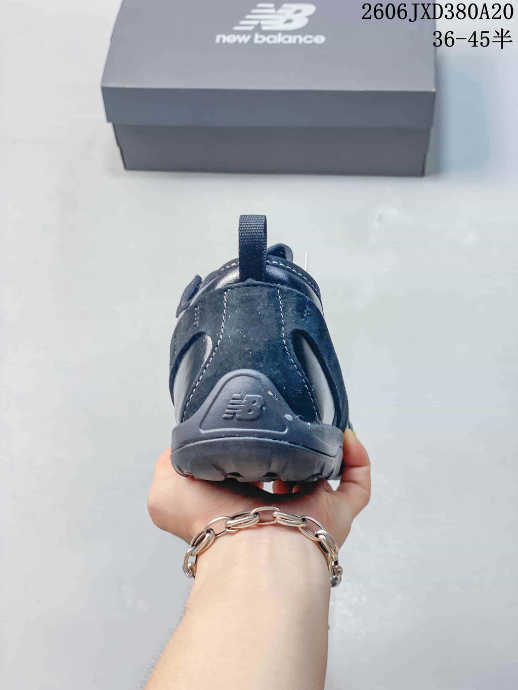 Rear view showing the heel panel and pull tab