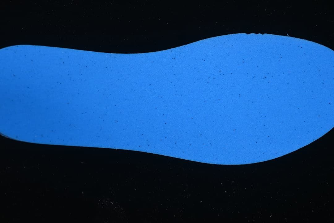 Blue outsole insert shown against a black background