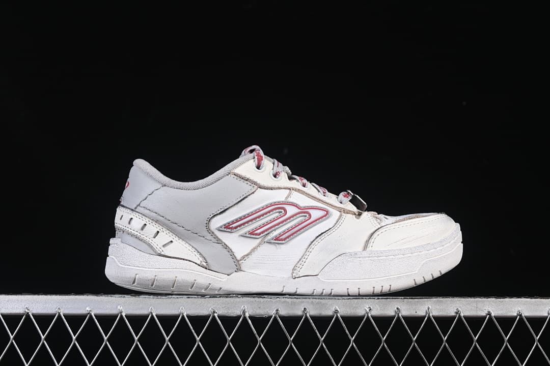 Side profile highlighting the low-top silhouette and layered panels