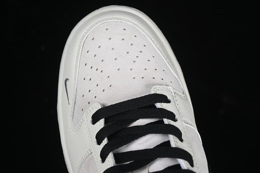 Top view of perforated toe box and black laces