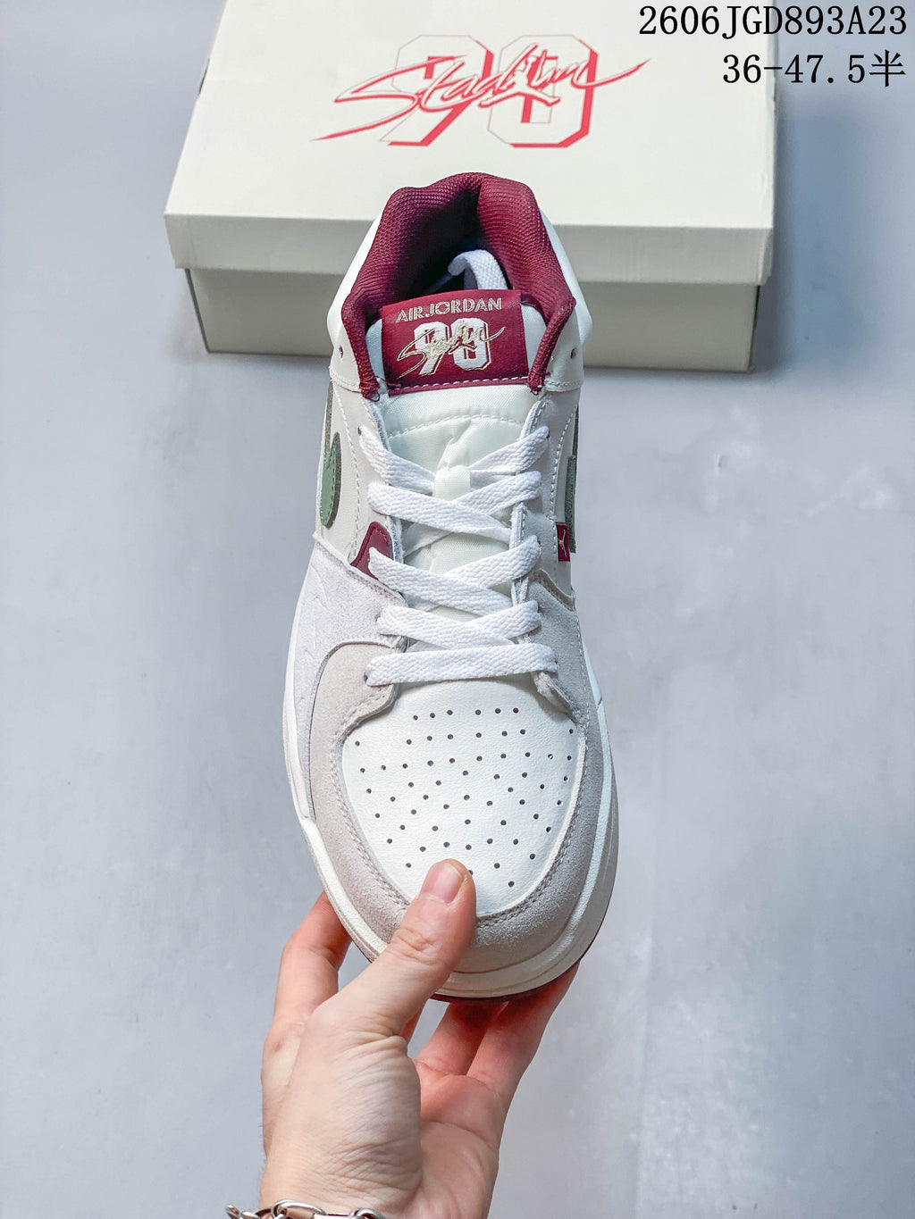 Top view of the Jordan Stadium 90 showing the perforated toe, white laces and burgundy tongue