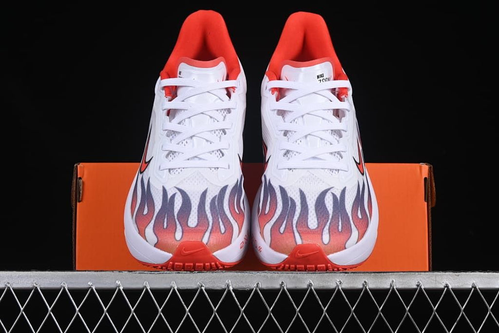 Front view of the pair showing flame graphics across the toes