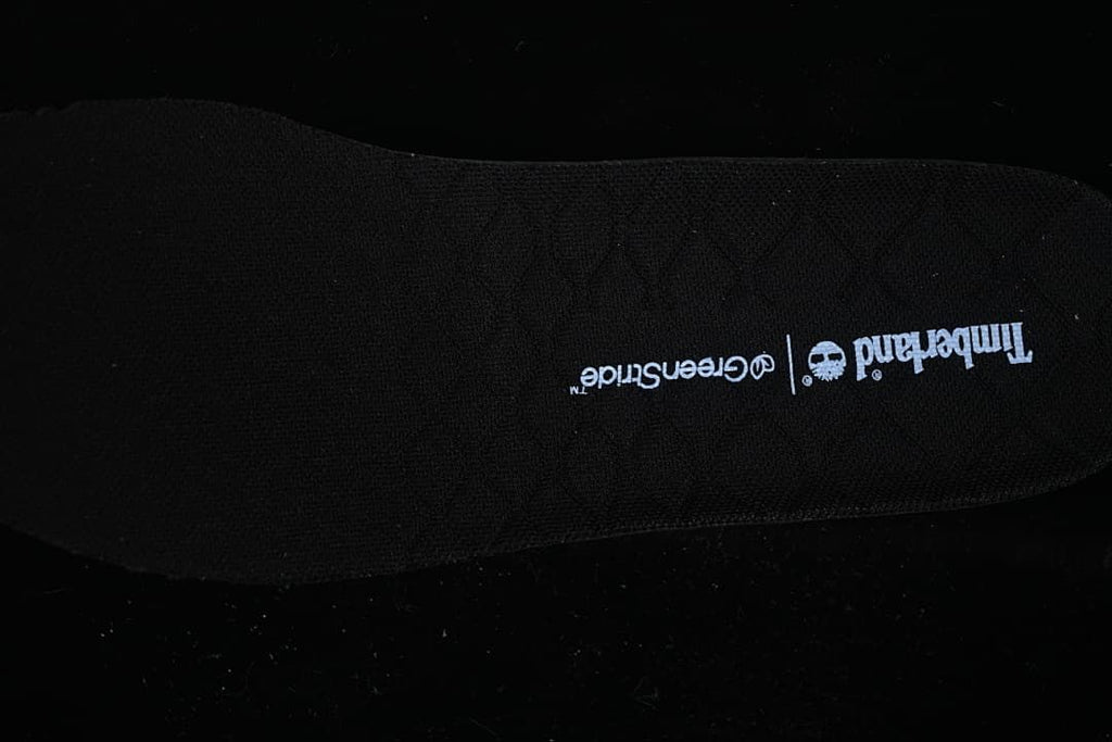 Close-up of the black insole with Timberland and Greenstride branding.